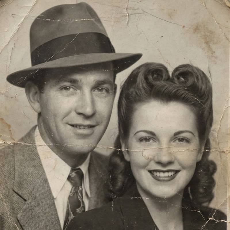 Original damaged family photo before restoration